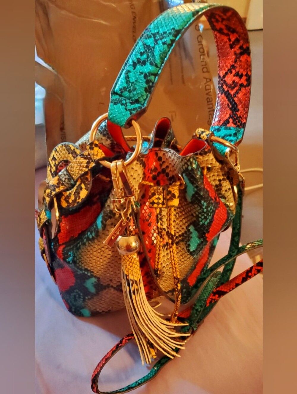 Aldo Multicolor Snake-Print Bucket Bag with Tassel And Crossbody Strap. NWOT